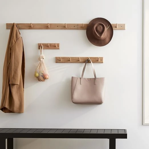 West Elm Sadie Wall Hooks above a narrow bench